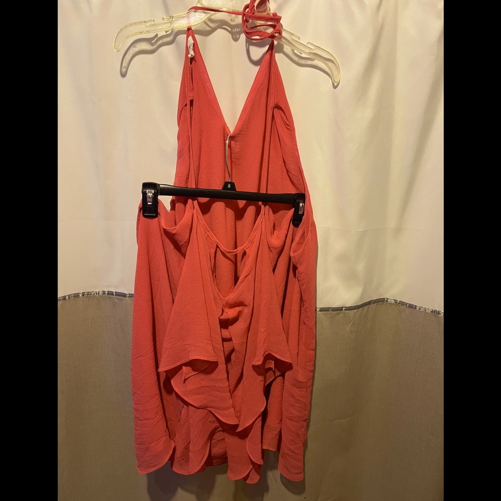Maurices Chiffon flowy halter top.  Ties in the back with keyhole neckline.